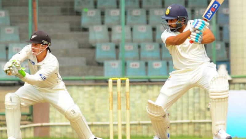 Rohit Sharma playing a shot on Day Two off Ish Sodhi's ball 