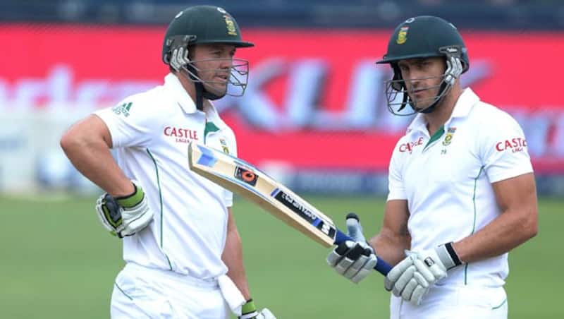 Faf-du-Plessis-R-of-South-Africa-celebrates-his-50-with-AB-de-Villiers-during-day-5-of-the