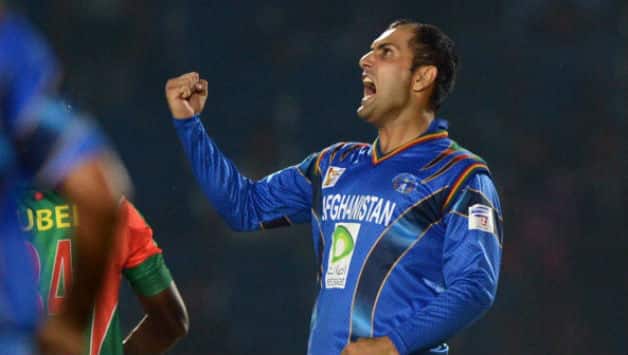 Mohammad Nabi celebrates after claiming final wicket of Rubel Hossain of Bangladesh in 2014 Asia Cup © AFP