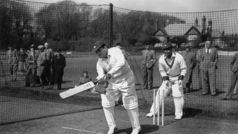 Gerry Gomez batting in the nets on the 1950 tour of England; keeping wickets is Clyde Walcott &copy; Getty Images