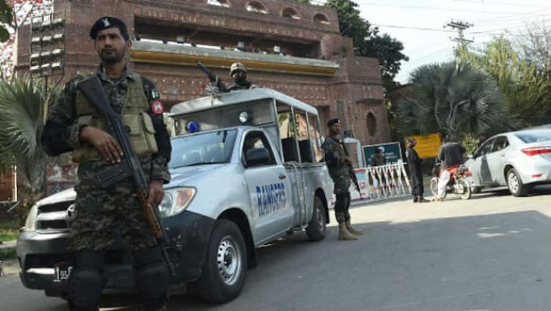 Pakistani soldiers patrol outside the Gaddafi Cricket Stadium in Lahore © AFP