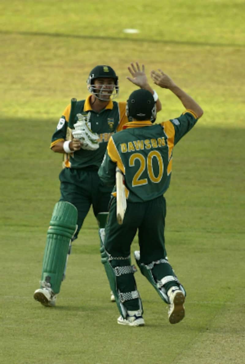 Alan Dawson punches the air in ecstasy after his last-ball heroics; Nicky Boje is in the background &Acirc;&copy; Getty Images