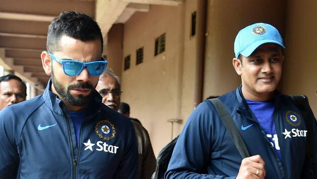 Virat Kohli (left) and Anil Kumble © AFP
