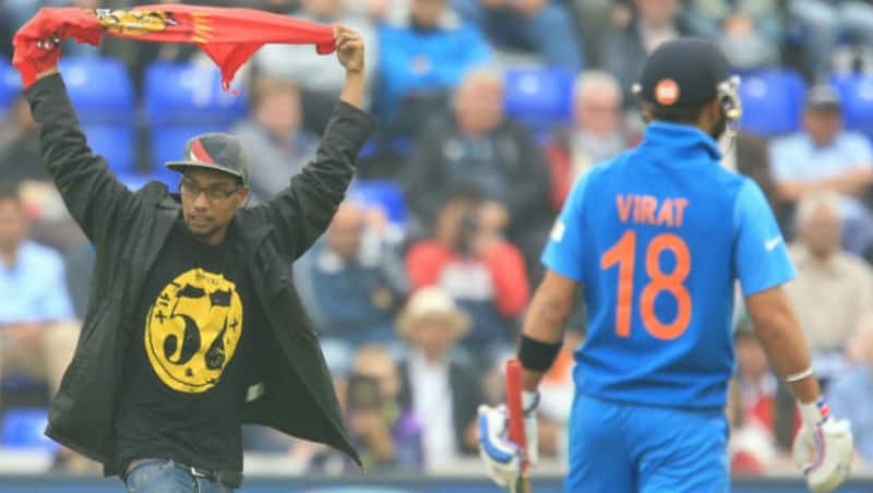 Tamil protestors invading the pitch during the Indian innings &Acirc;&copy; Getty Images