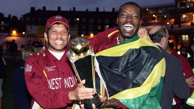 Chris Gayle (right) celebrates Champions Trophy triumph 2004 with Ramnaresh Sarwan © Getty Images