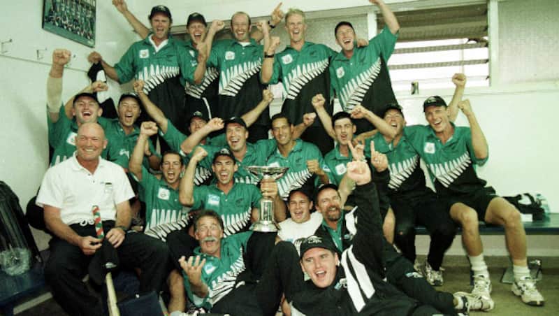 New Zealand celebrate with the ICC Mini World Cup in the dressing-room &Acirc;&copy; Getty Images