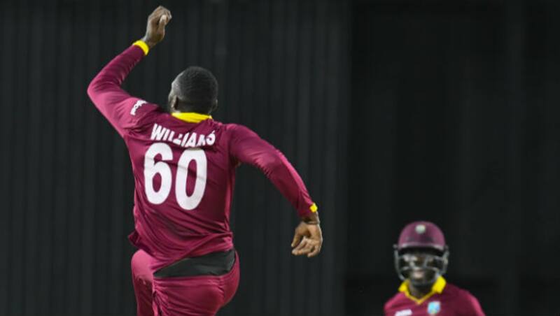 Kesrick Williams celebrates the wicket of Samiullah Shenwari  &copy; AFP