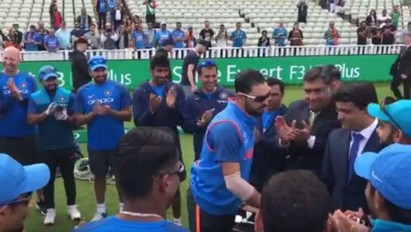 Yuvraj being presented with the memento by Ganguly ahead of the semi-final 2. Image courtesy: ICC Twitter video grab