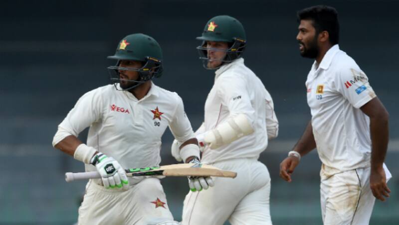 Raza and Moor formed an unbeaten 107-run partnership &Acirc;&copy; AFP