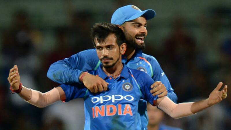 Yuzvendra Chahal and Virat Kohli © AFP
