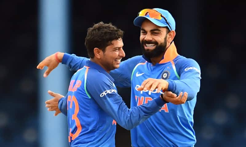 Kuldeep Yadav and Virat Kohli &copy; Getty Images