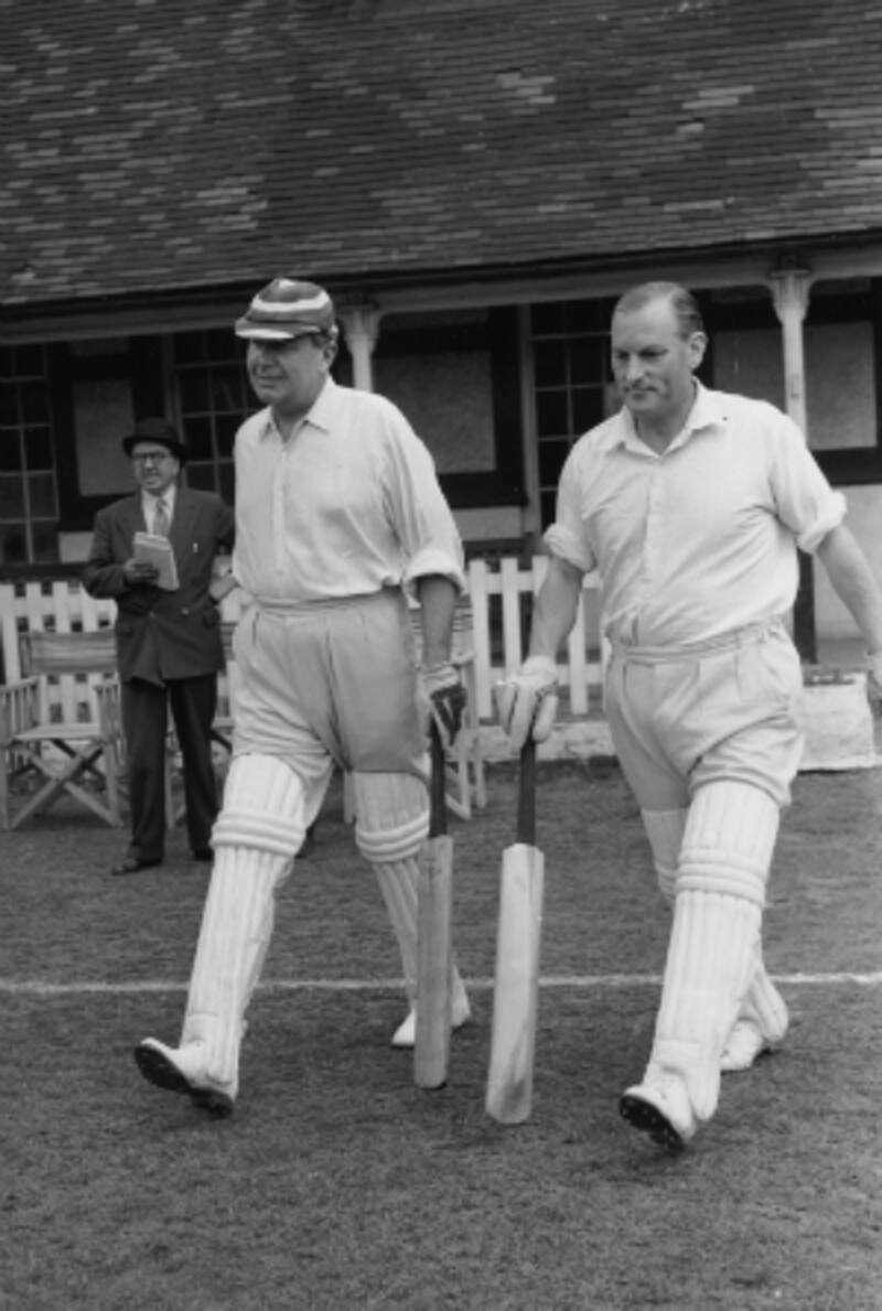 Bernard Hollowood (left) walks out to bat with EW Swanton &Acirc;&copy; Getty Images