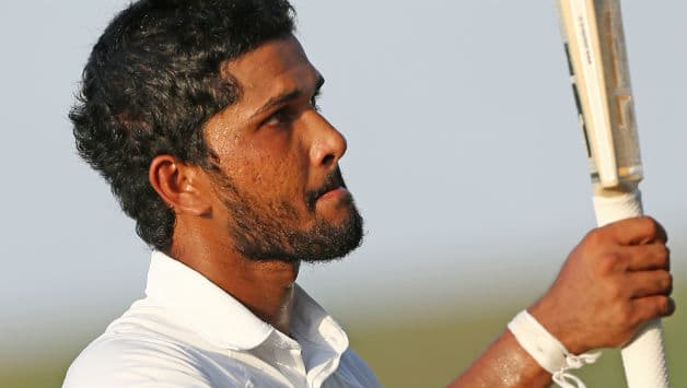 Dinesh Chandimal is unbeaten on 60* © AFP