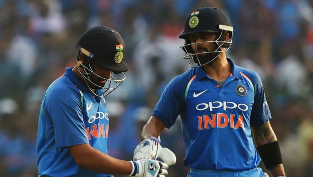 Rohit and Kohli, who added 230 runs together, are now the only players to score over 1,000 runs in ODIs this year. Their magnificent hundreds propelled India to 330 for 6. © AFP