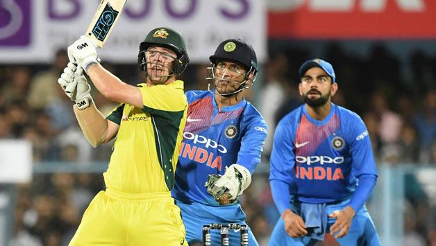 Henriques (62*) added 109 runs with Travis Head (48*), taking Australia over the line by 8 wickets. © AFP