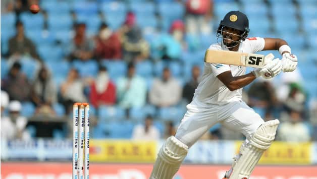 Chandimal scored the second half-century of the innings. He was dismissed for 57 by Ashwin © AFP