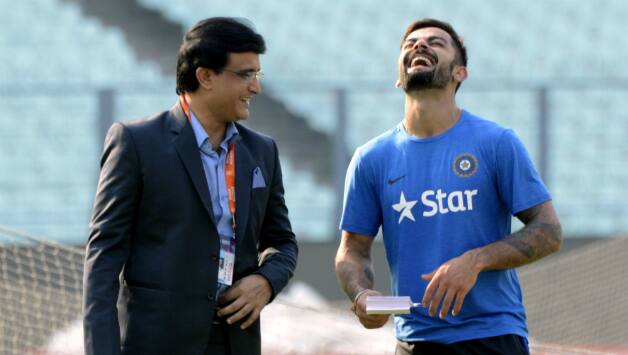 Virat Kohli (R) and Sourav Ganguly © AFP