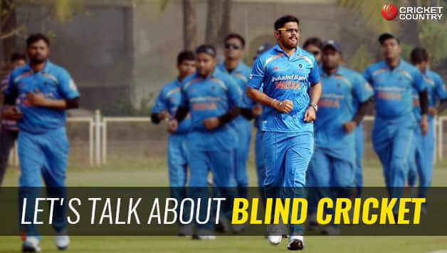 Ajay Reddy (C) with India's blind cricket team © PTI