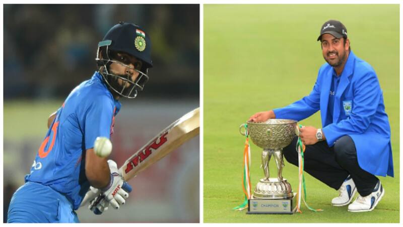 Virat Kohli and Shiv Kapur &copy; AFP and Getty Images