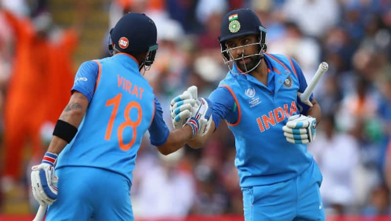 Rohit Sharma (R) will take over the mantle from Virat Kohli (L) &copy; Getty Images 
