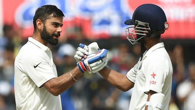 Virat Kohli (L) and Ajinkya Rahane © AFP