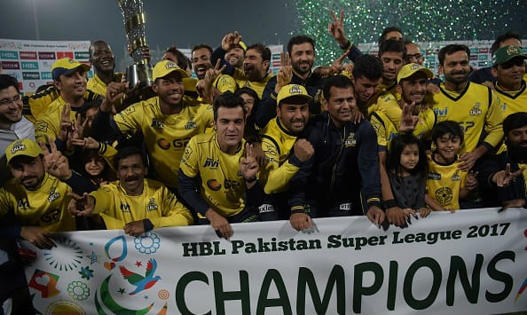 Caption: Darren Sammy with Peshawar Zalmi after winning PSL 2017 in Lahore (AFP)