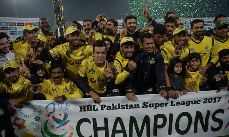 Caption: Darren Sammy with Peshawar Zalmi after winning PSL 2017 in Lahore (AFP)