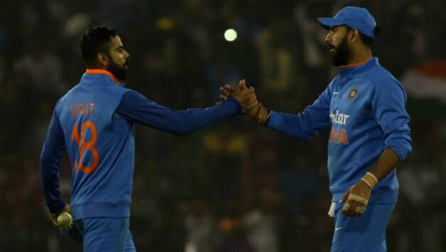 Virat Kohli (L) and Yuvraj Singh © IANS