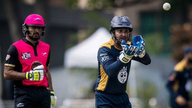 Nizakat Khan (left) and Kumar Sangakkara won the Man of the Match (final) and Man of the Tournament respectively © Ike Li / Ike Images