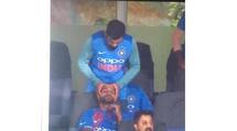 Virat Kohli gives Shikhar Dhawan a head massage during last T20I