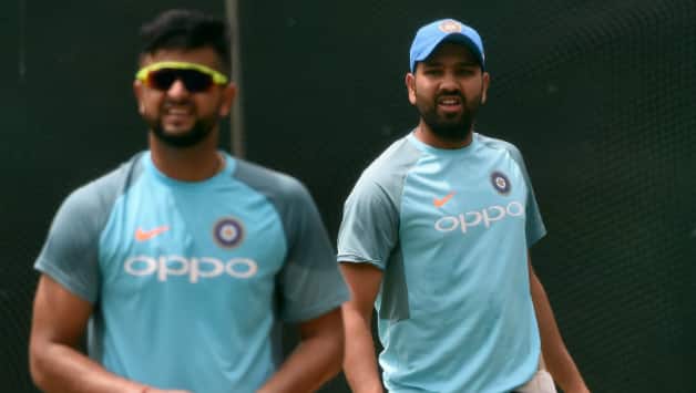 Suresh Raina and Rohit Sharma © AFP