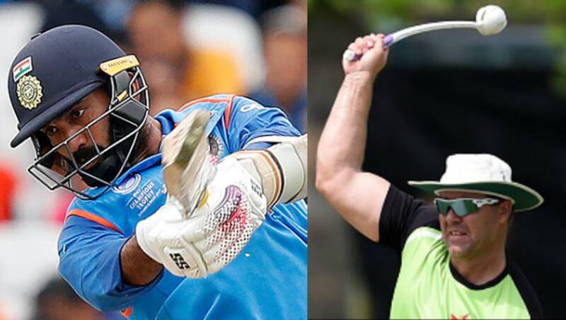 Dinesh Karthik (left) and Heath Streak were in the Gujarat Lions camp in the previous two IPL seasons &copy; AFP