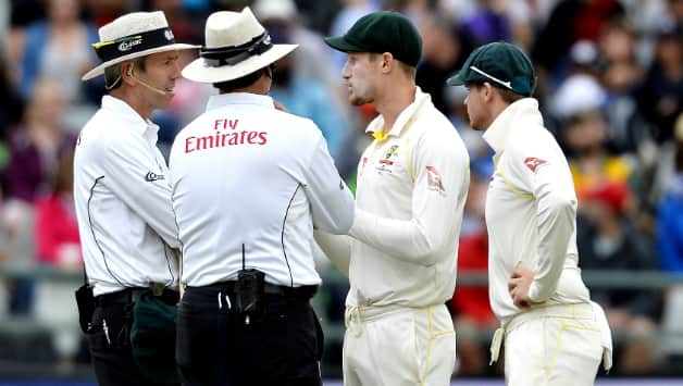 Cameron Bancroft, Steven Smith in chat with the on-field umpires after being caught in the ball-tampering act © Getty Images