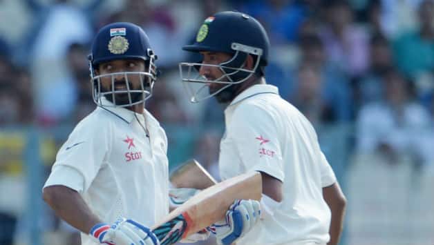 Ajinkya Rahane (L) and Cheteshwar Pujara © AFP