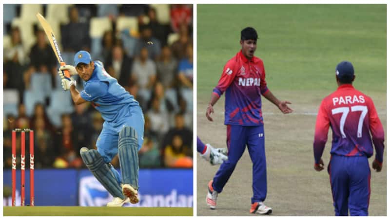 MS Dhoni and Nepal teammates © AFP