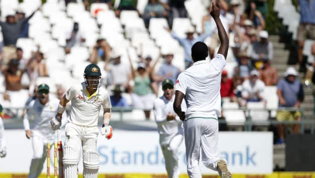 David Warner (L) and Kagiso Rabada © AFP