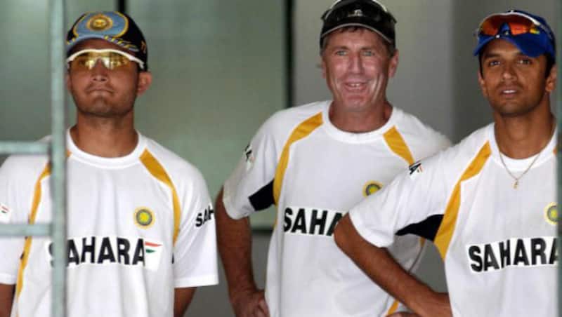 From left: Sourav Ganguly, John Wright and Rahul Dravid &copy; AFP