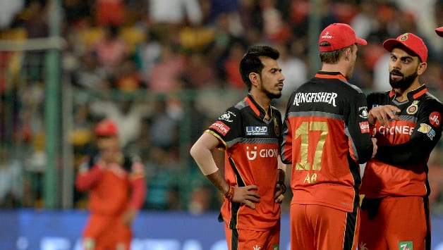 Yuzvendra Chahal (left), AB de Villiers (middle) and Virat Kohli (right) © AFP