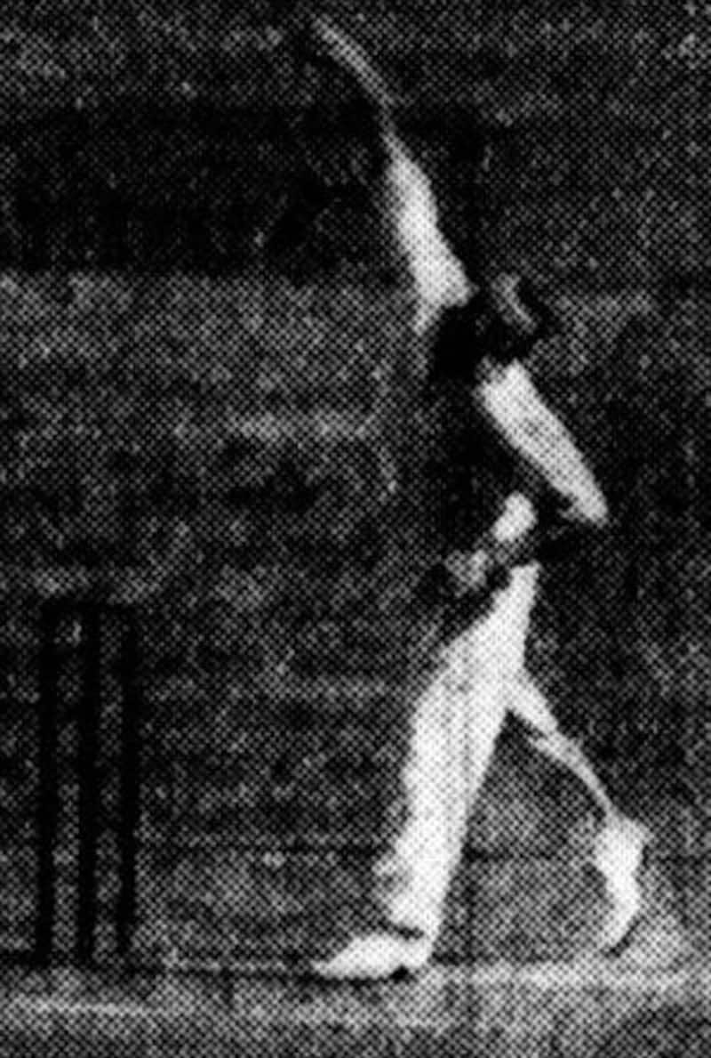 Not an everyday sight: Don Bradman bowling during the course of the match (courtesy: The Sun)