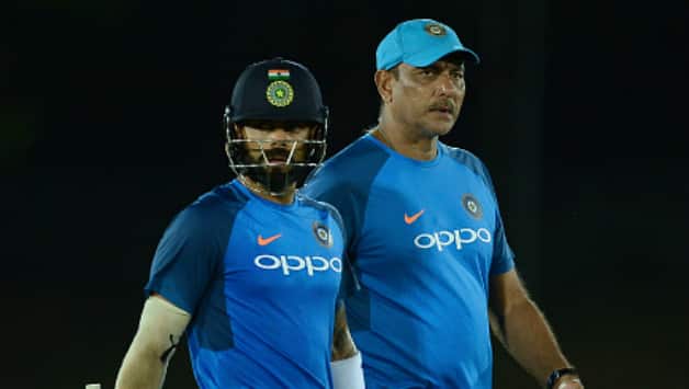 Virat Kohli with India coach Ravi Shastri © AFP