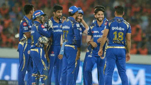 Mayank Markande (center) keeps Mumbai in hunt with 4-for; walks away with Purple Cap © AFP