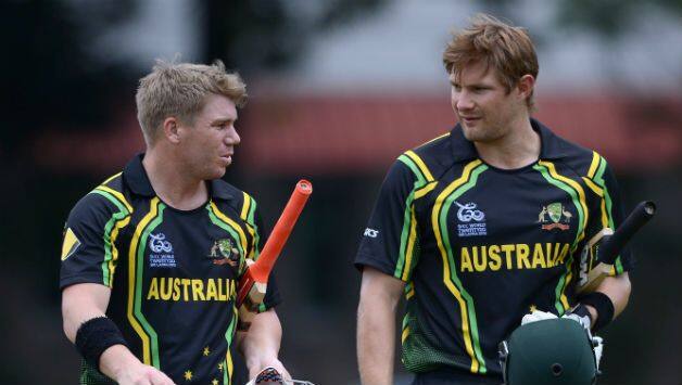 David Warner seen with Shane Watson in T20 WC 2016 © AFP