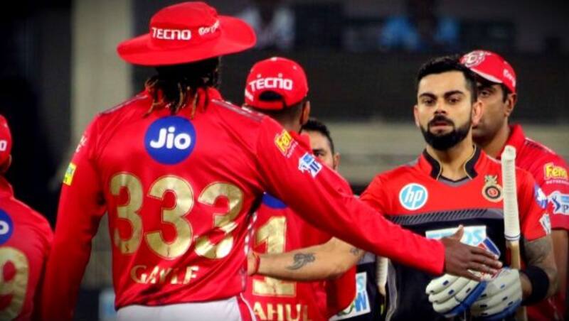 Virat Kohli and Chris Gayle © IANS