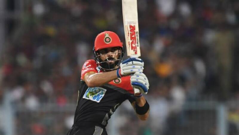 Virat Kohli contributed with a magnificent 70 in RCB's chase over DD &copy; AFP