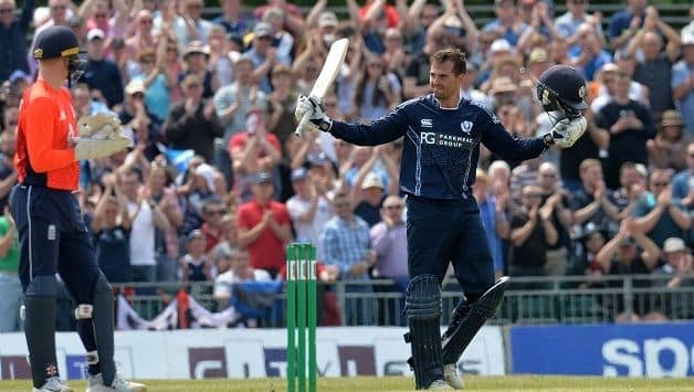 Calum MacLeod celebrates his hundred against England © Getty Images