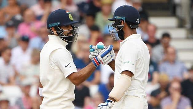 Lunch report: Kohli, Pujara take India forward after Broad nails two