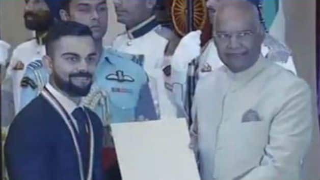 Virat Kohli with Ramnath Kovind