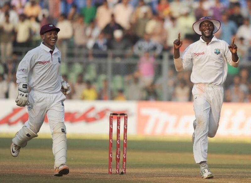 Darren Sammy can hardly believe that West Indies have pulled off a draw in Mumbai. @AFP