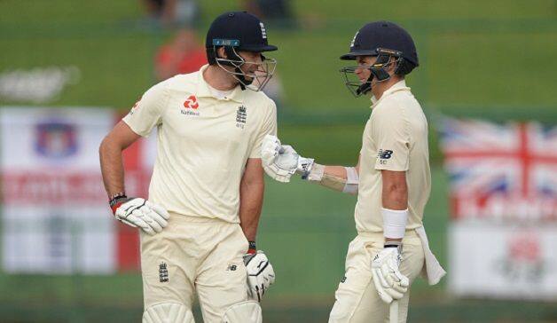 England's James Anderson and Sam Curran. @ Getty Images