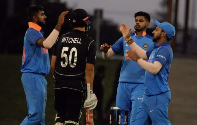 Vijay Shankar (left) picked up the wicket of Daryl Mitchell.